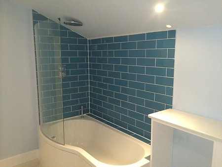 Bathrooms & Kitchens. blue bathtub