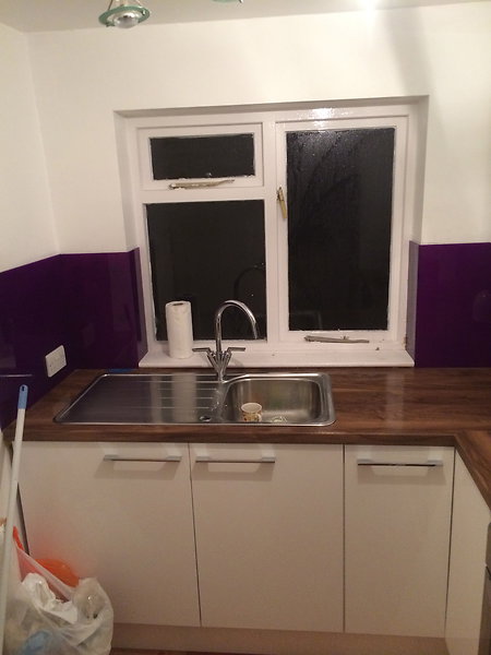 Bathrooms & Kitchens. Purple sink